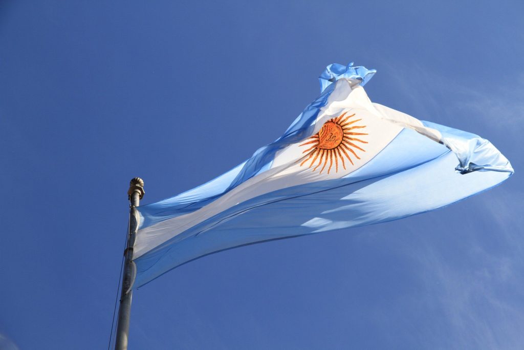 Inmigrante - Bandera Argentina