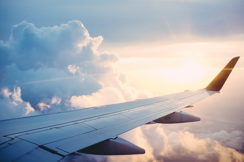 Collegamenti verso l'Italia. Aereo in volo